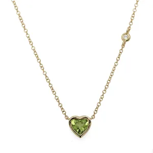 14K BEZEL SET PERIDOT HEART WITH SINGLE OFF-SET DIAMOND NECKLACE